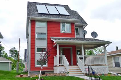 Red single family net zero energy home from Twin Cities Habitat for Humanity