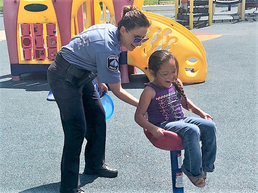 Police officer with kid.