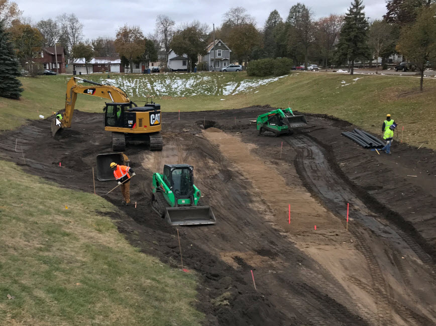 Public Works construction workers and equipment in Holland Basin