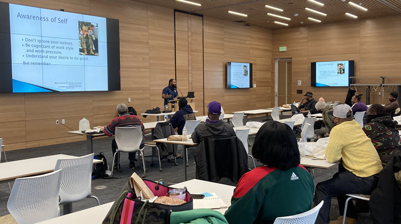 people in classroom attending violence prevention training