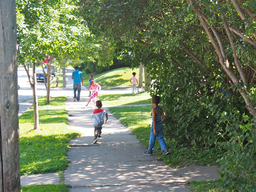 Kids playing on Minneapolis sidewalk