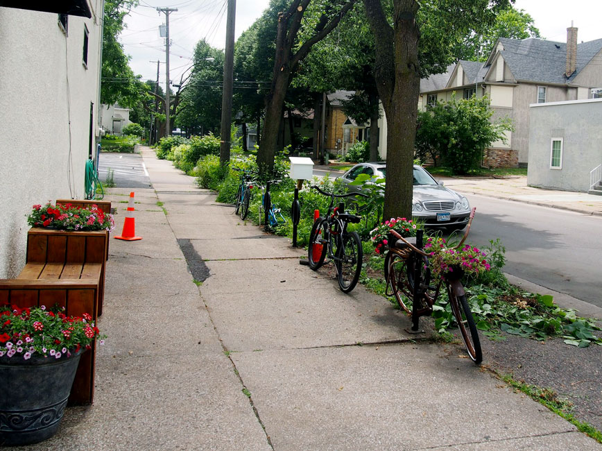 Minneapolis sidewalk with flowers and bikes