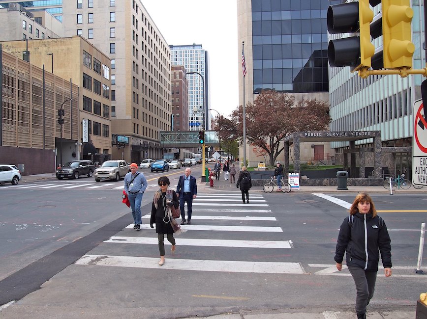 Pedestrians on crosswalk at 4th St S downtown