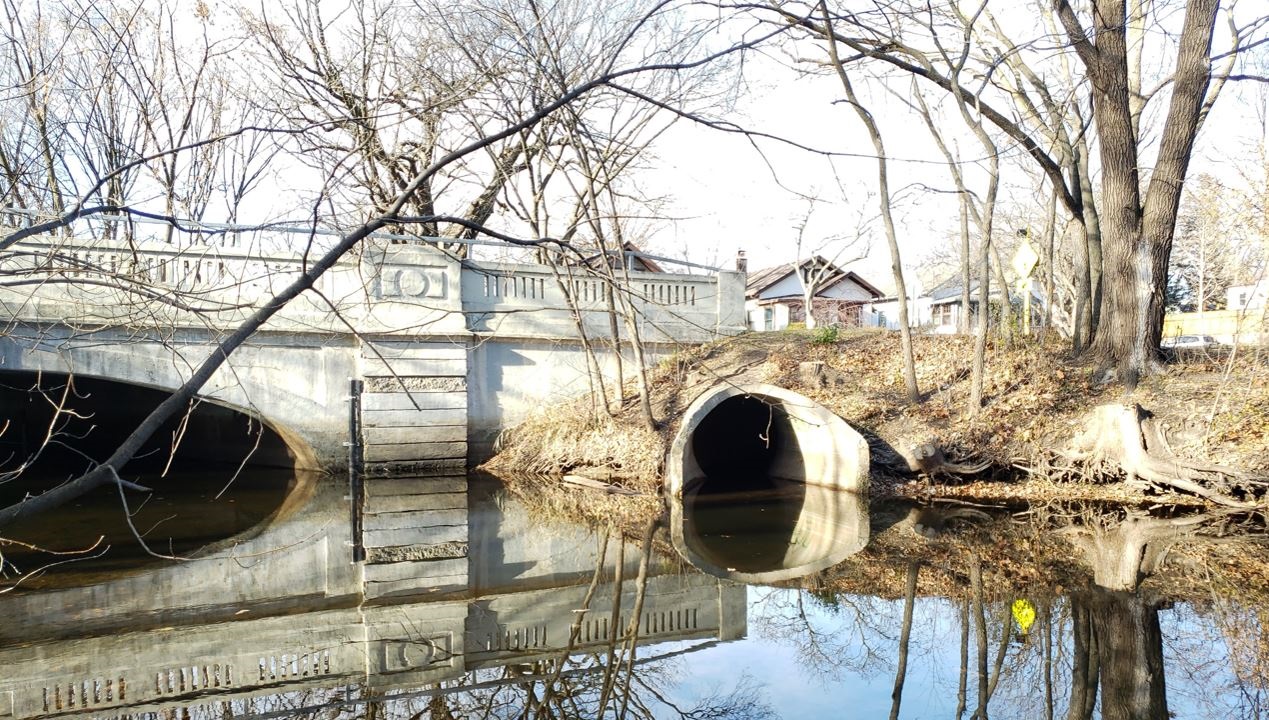 Two Metal Outfalls at Creek