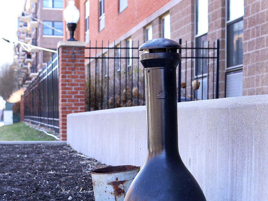 An ash receptacle outside a building