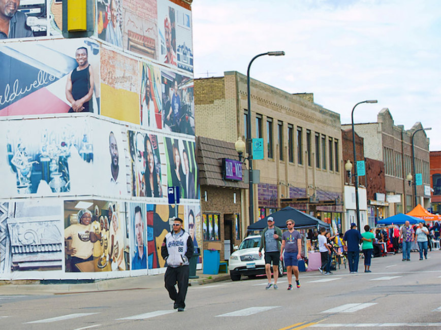 People walking through Open Streets Mpls 2019 in North Minneapolis.
