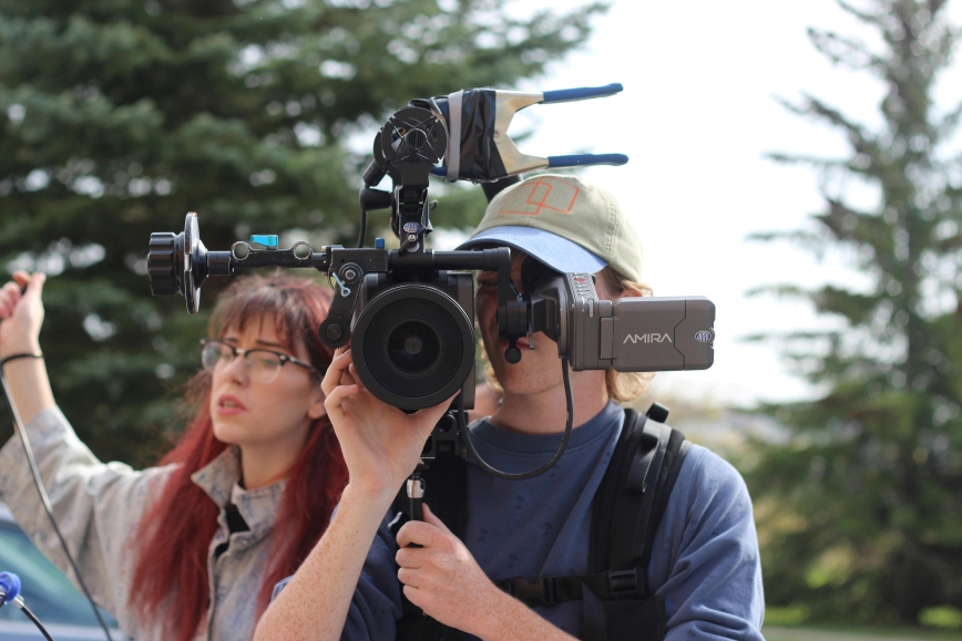 videographer filming a person