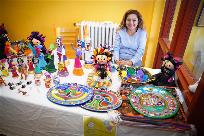 A small business owner selling unique, homemade art pieces