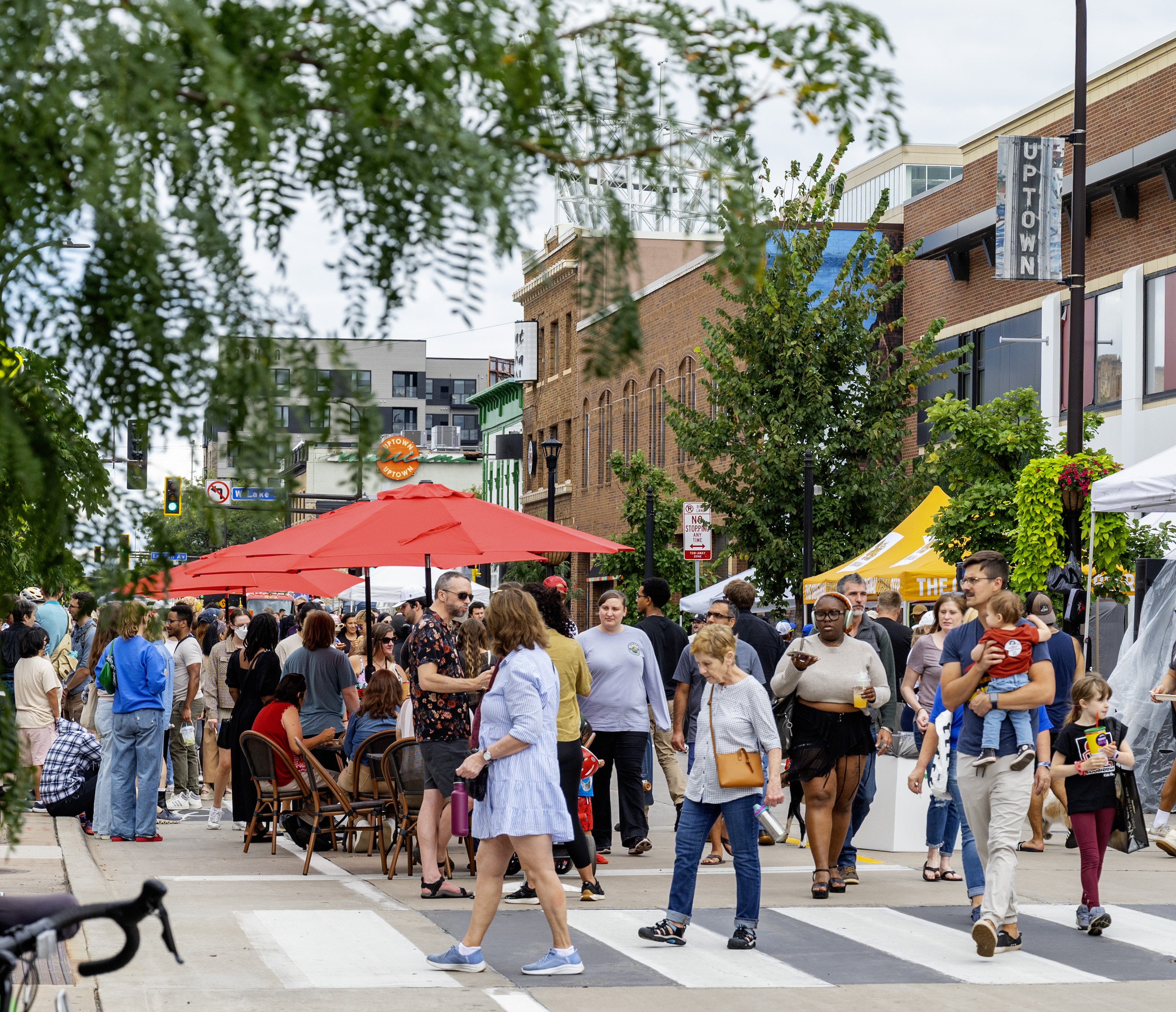 Minneapolis community members walking around Open Streets.