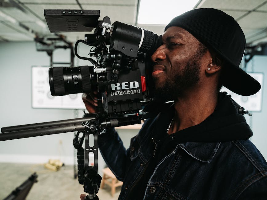 Person filming with large camera