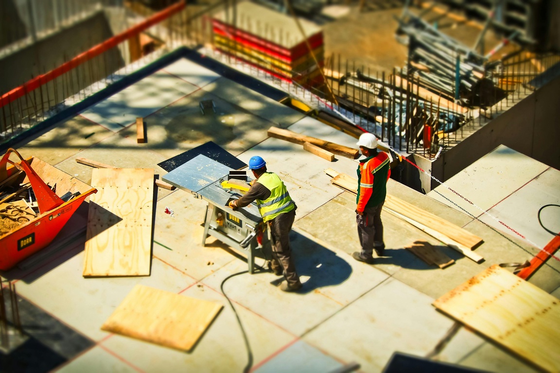 Two people on construction site