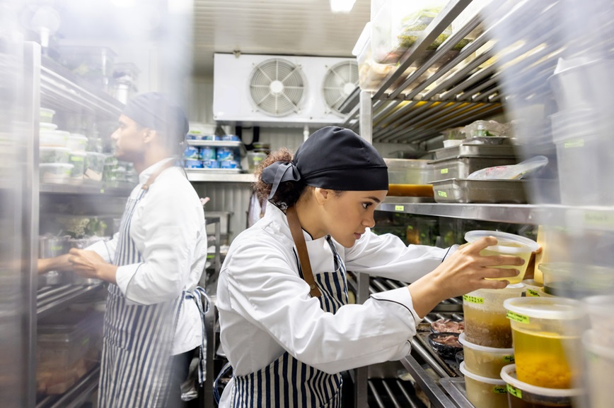 Cook working at a restaurant looking for ingredients