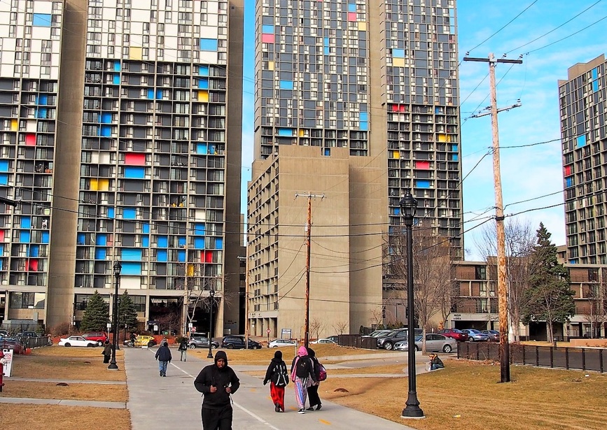 People walking by Cedar Riverside