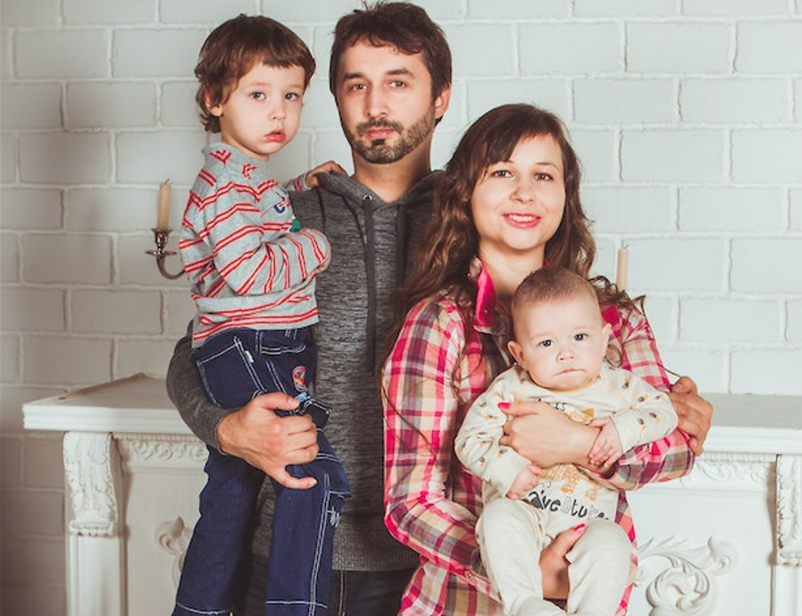 Family posing for photo