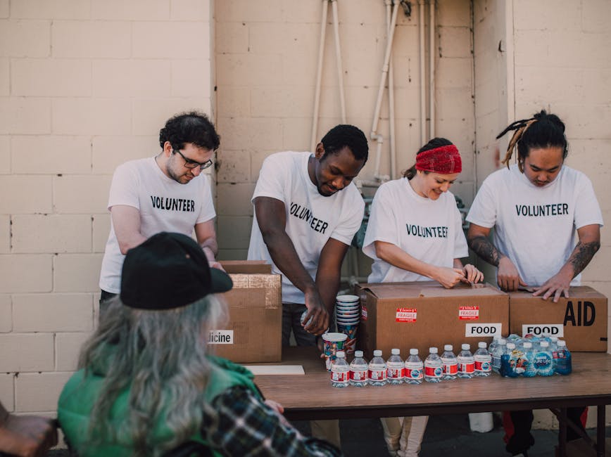 Volunteers packing donations of food