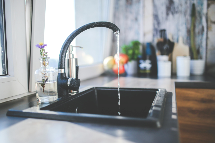 kitchen sink with water running
