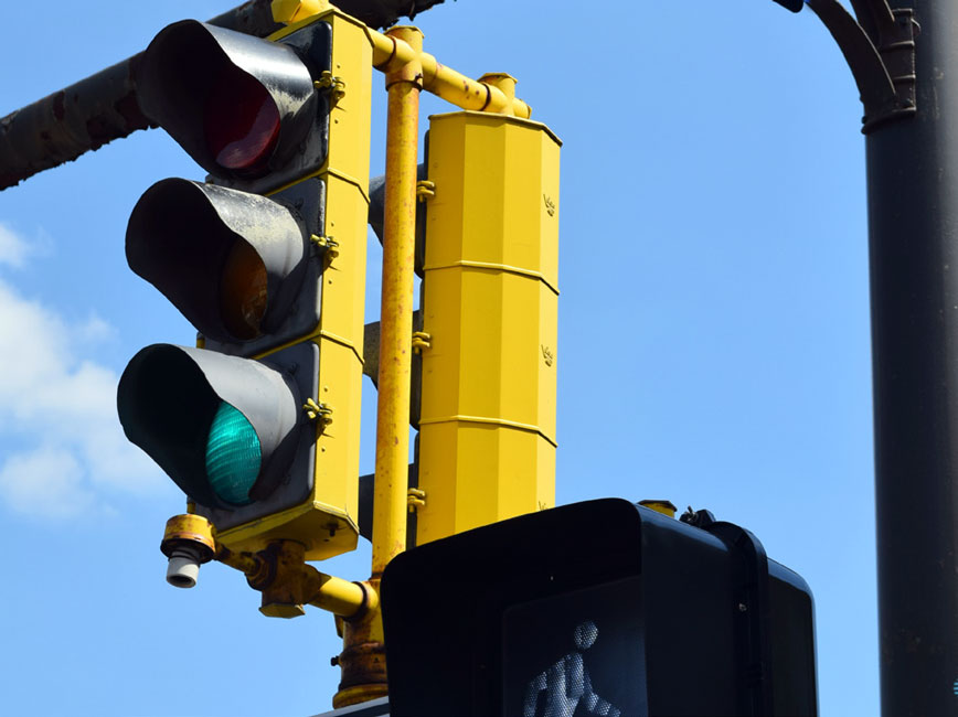 Traffic light on street sign