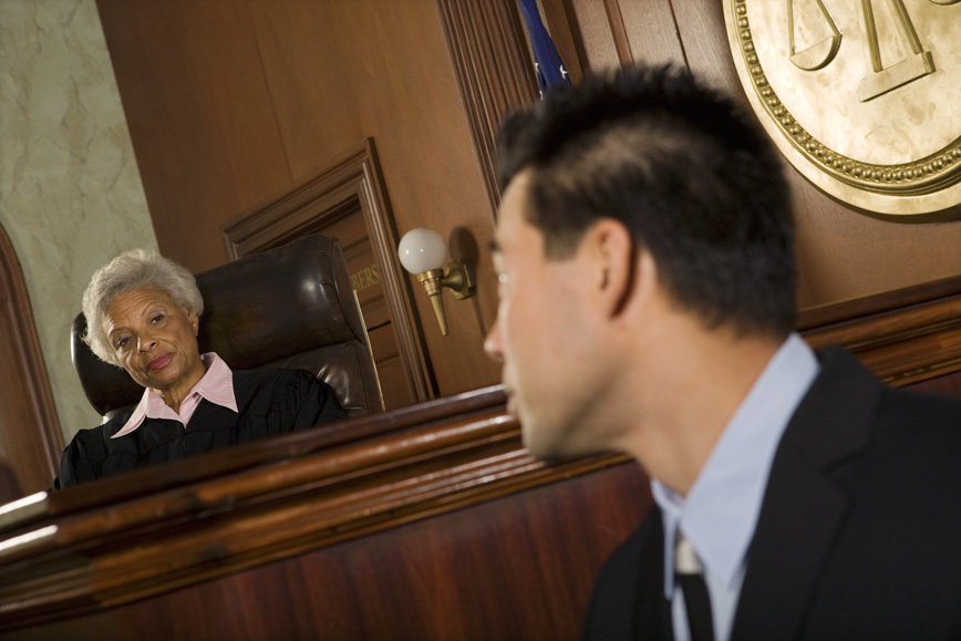 witness looking at judge in courtroom