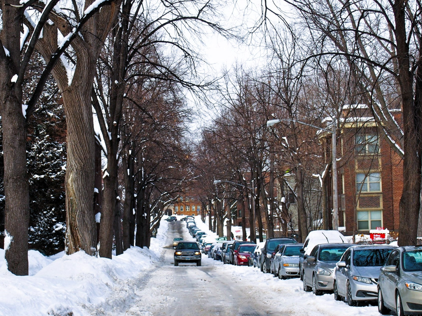 Car driving down road in winter