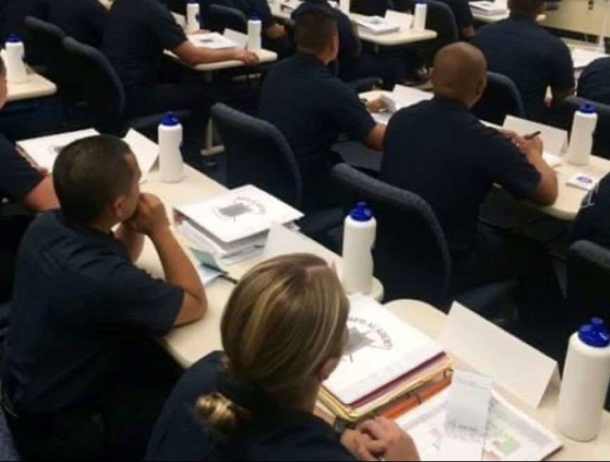 Police recruits in classroom