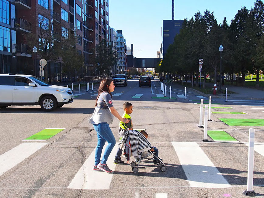 mother and children on crosswalk