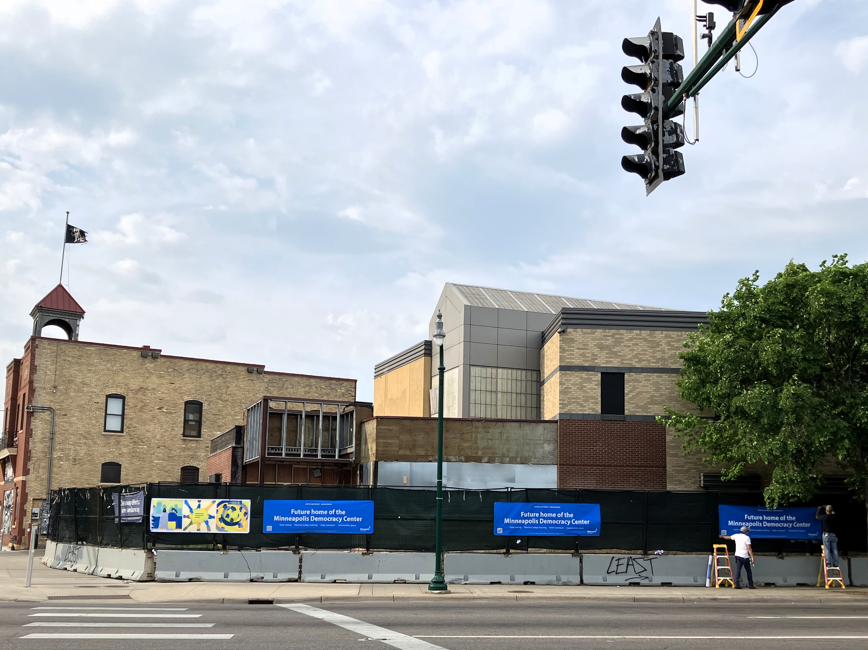 New signs at Minneapolis Democracy Center building