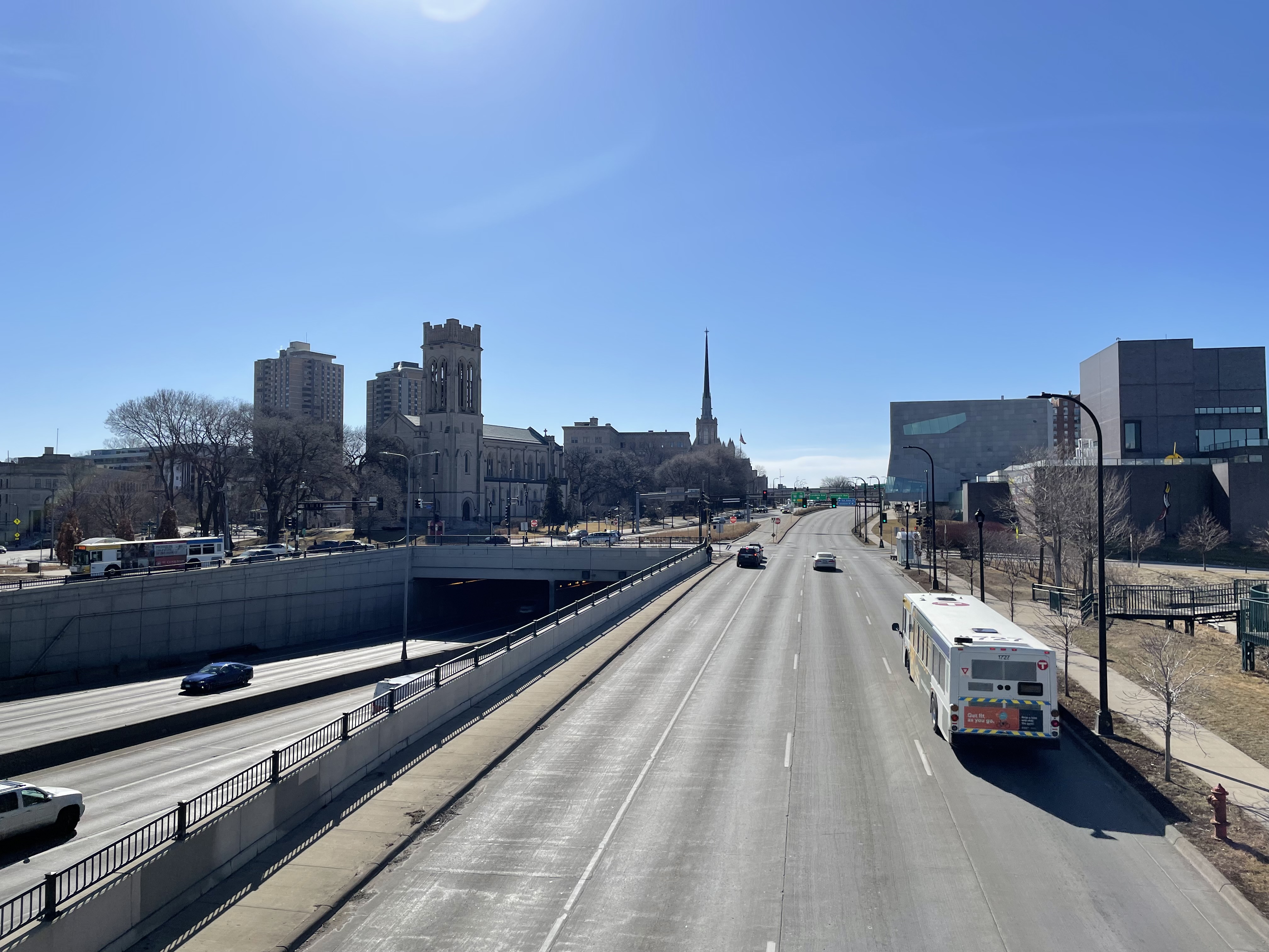 Street with vehicles and a Metro Transit bus