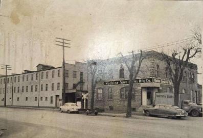 C.A Smith and Northwestern Compo Board Factory Building and C.A. Smith Office Building, looking northwest from Lyndale Ave. N. Date unknown.