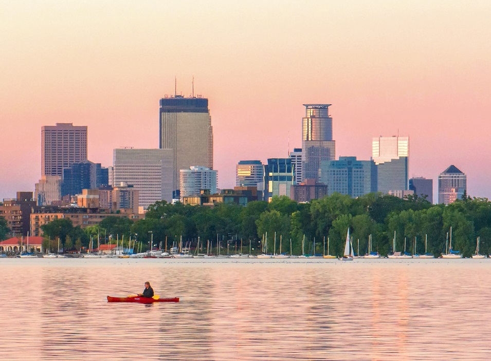Minneapolis skyline at dusk from Lake Bde Maka Ska; Courtesy Meet Minneapolis; CREDIT: Krivit Photography