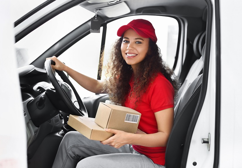 Commercial vehicle delivering boxes