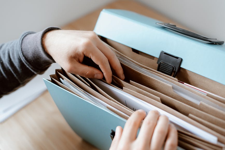 Person looking through folder