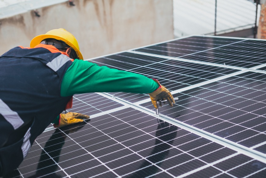 person installing solar panel person installing solar panel