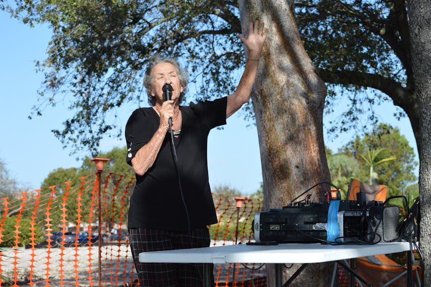 Person holding microphone