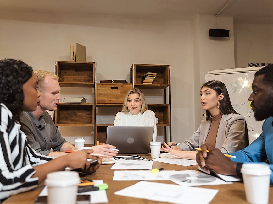 People planning at a table collaborating