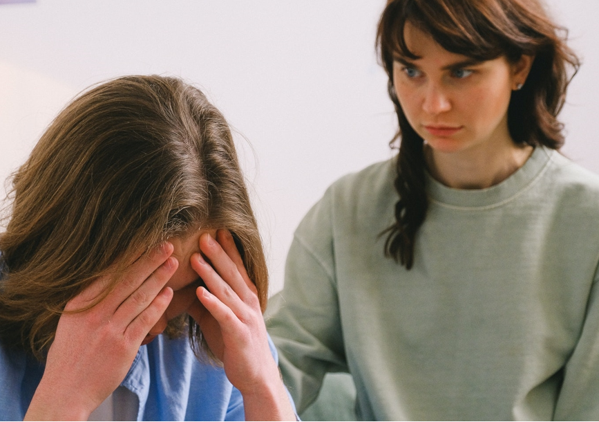 person comforting another in crisis