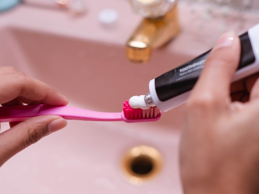 applying toothpaste